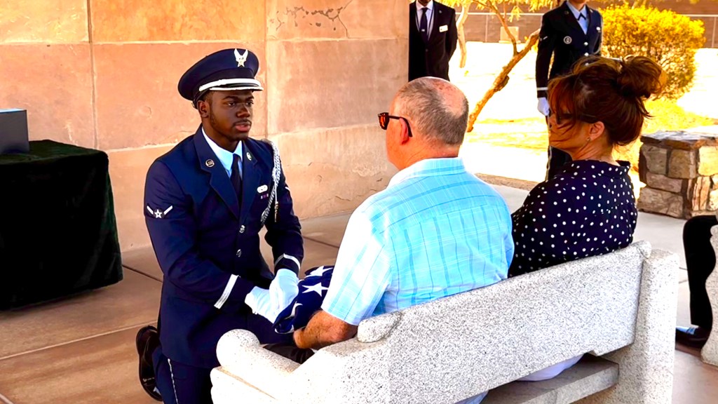 flag folder at national cemetery, Phoenix Arizona 
